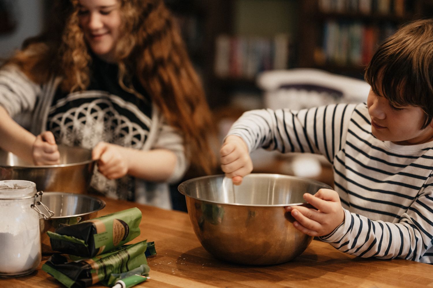 grandchildren making dinner